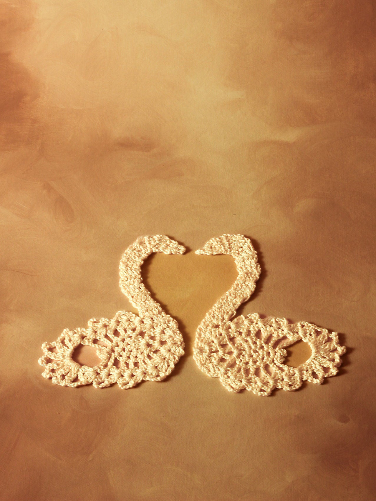 Cisnes de ganchillo beige