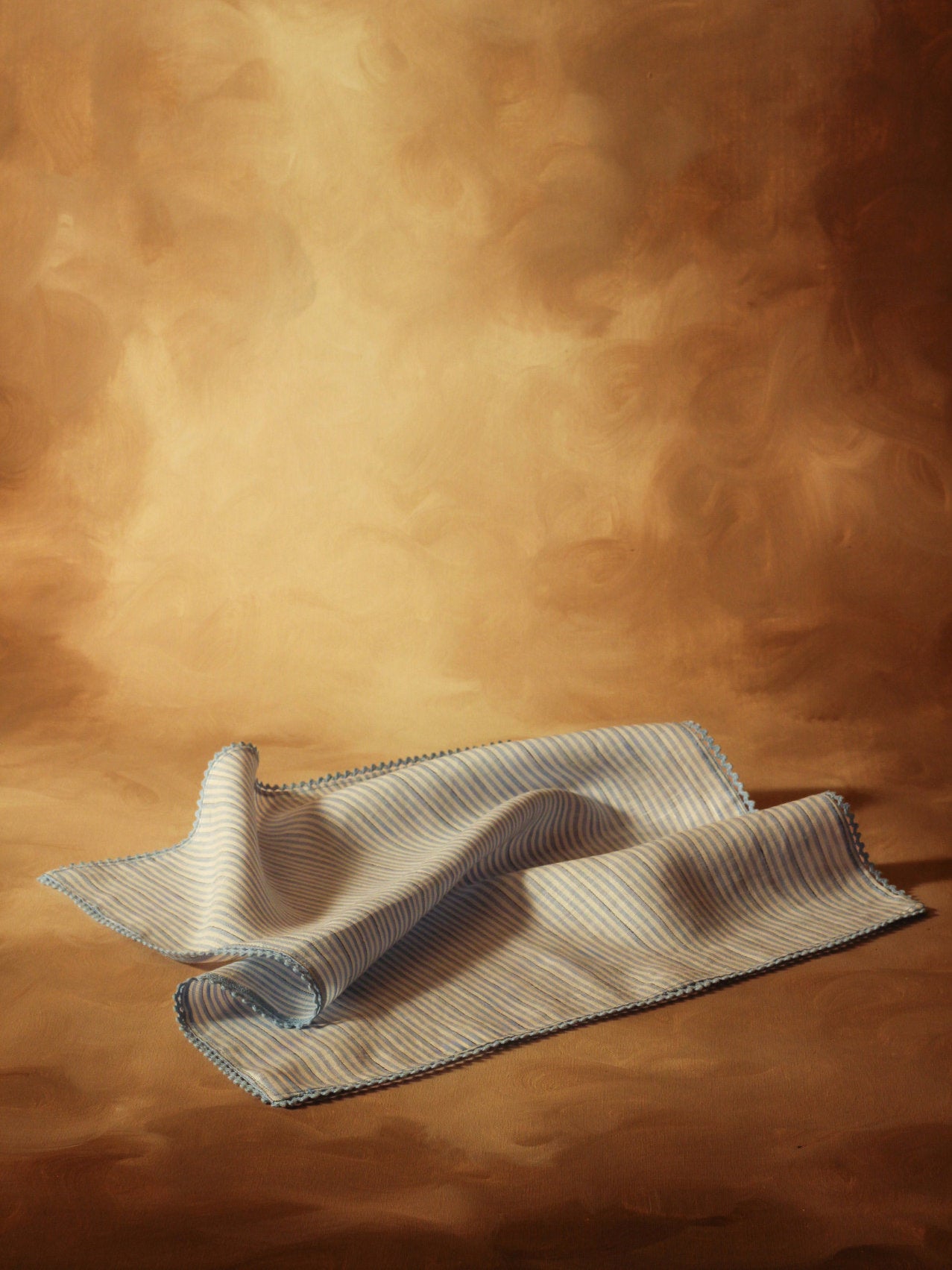 Servilleta azul rayas